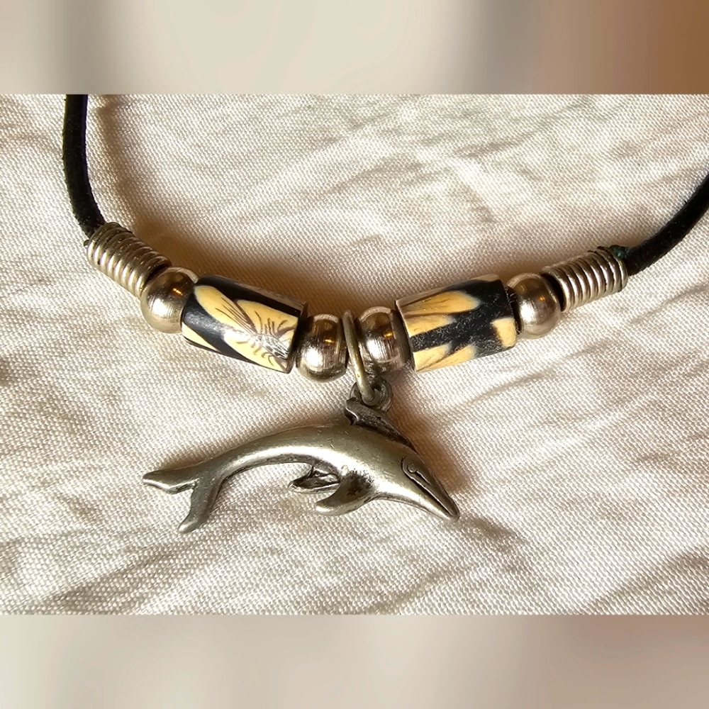 Vintage choker necklace with silver tone dolfin pendant. Unisex